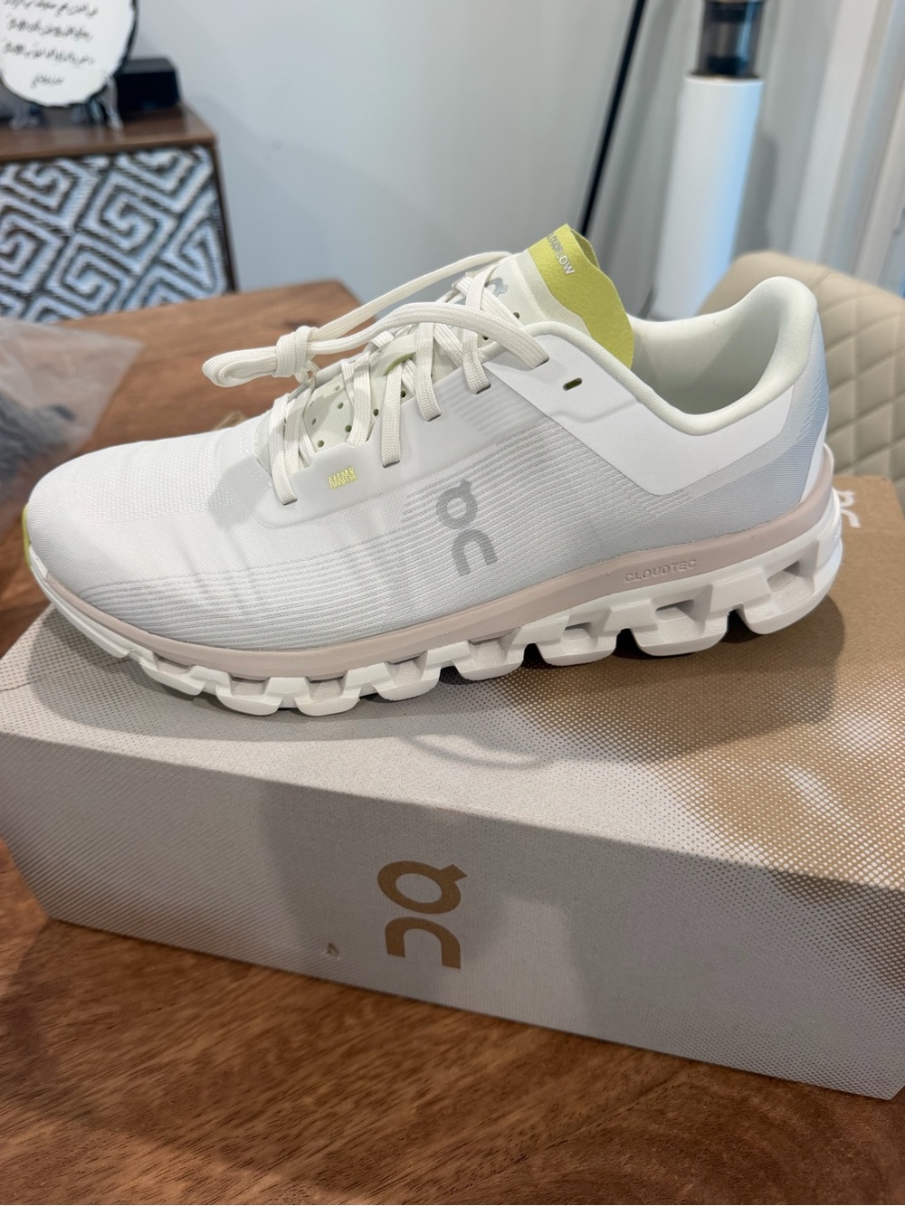 On Running Women's White Athletic Shoe with Pink Midsole Trim & Lime Tongue